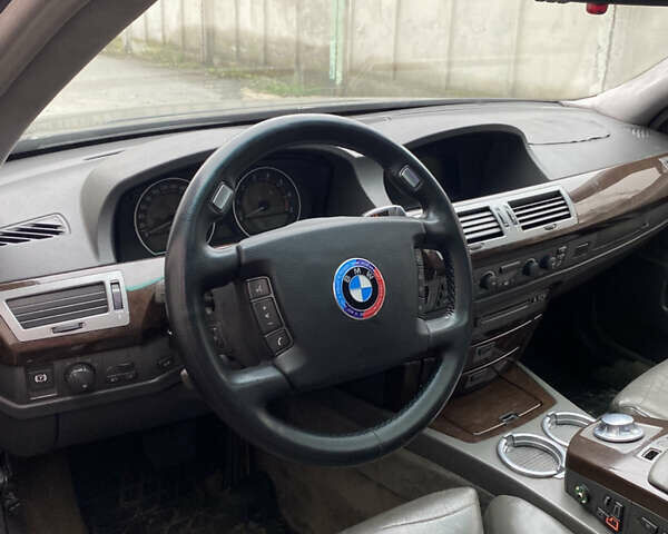 Черный БМВ 7 Серия, объемом двигателя 4.4 л и пробегом 400 тыс. км за 3600 $, фото 10 на Automoto.ua