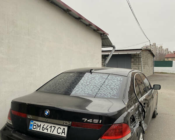 Черный БМВ 7 Серия, объемом двигателя 4.4 л и пробегом 400 тыс. км за 3600 $, фото 3 на Automoto.ua