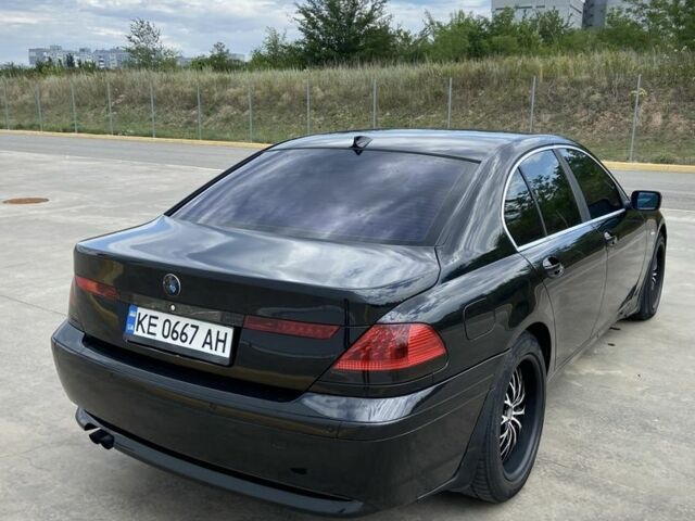Черный БМВ 7 Серия, объемом двигателя 4.4 л и пробегом 350 тыс. км за 5000 $, фото 4 на Automoto.ua