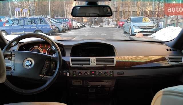 Черный БМВ 7 Серия, объемом двигателя 4.4 л и пробегом 167 тыс. км за 8699 $, фото 44 на Automoto.ua