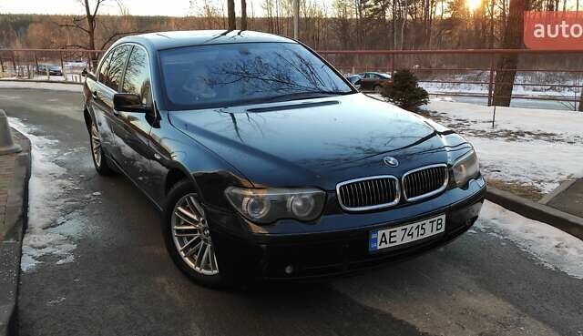 Черный БМВ 7 Серия, объемом двигателя 4.4 л и пробегом 167 тыс. км за 8699 $, фото 95 на Automoto.ua