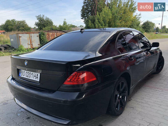 Черный БМВ 7 Серия, объемом двигателя 4.4 л и пробегом 465 тыс. км за 4450 $, фото 8 на Automoto.ua