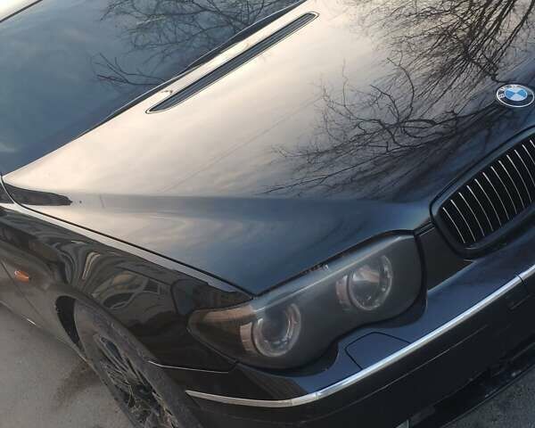 Черный БМВ 7 Серия, объемом двигателя 4.4 л и пробегом 430 тыс. км за 5600 $, фото 6 на Automoto.ua
