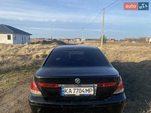 Черный БМВ 7 Серия, объемом двигателя 3.6 л и пробегом 287 тыс. км за 6200 $, фото 7 на Automoto.ua