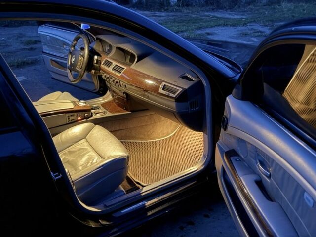 Черный БМВ 7 Серия, объемом двигателя 4.4 л и пробегом 411 тыс. км за 4600 $, фото 4 на Automoto.ua