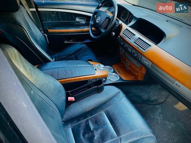 Чорний БМВ 7 Серія, об'ємом двигуна 3.6 л та пробігом 275 тис. км за 6000 $, фото 4 на Automoto.ua