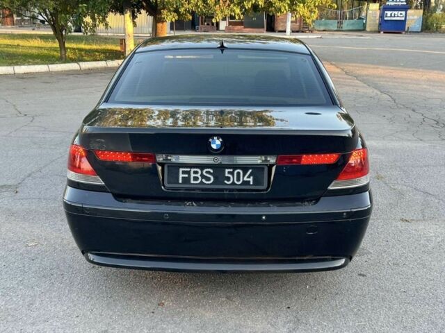 Чорний БМВ 7 Серія, об'ємом двигуна 3 л та пробігом 380 тис. км за 3700 $, фото 1 на Automoto.ua