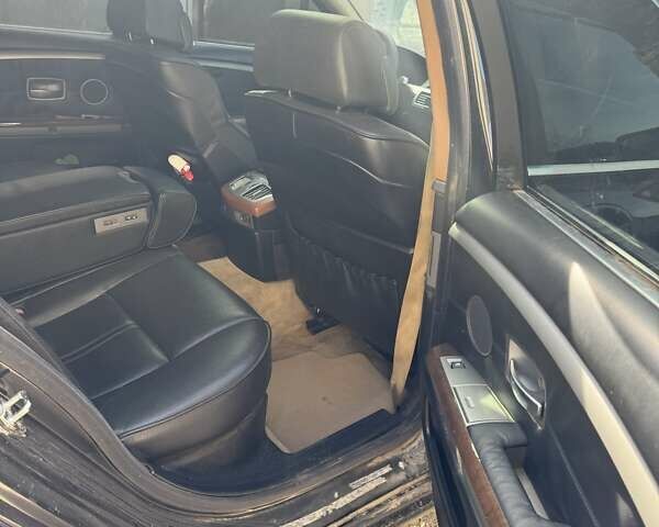 Черный БМВ 7 Серия, объемом двигателя 3 л и пробегом 400 тыс. км за 2500 $, фото 7 на Automoto.ua