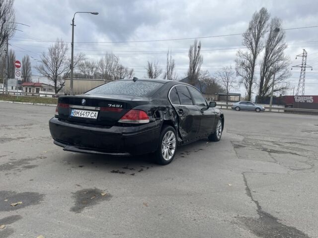 Черный БМВ 7 Серия, объемом двигателя 4.4 л и пробегом 320 тыс. км за 4000 $, фото 4 на Automoto.ua