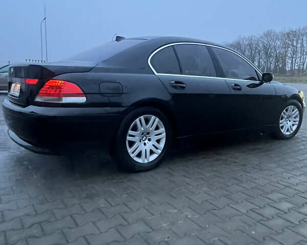 Черный БМВ 7 Серия, объемом двигателя 3.6 л и пробегом 380 тыс. км за 7000 $, фото 3 на Automoto.ua