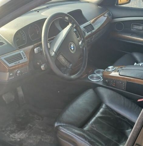 Чорний БМВ 7 Серія, об'ємом двигуна 3 л та пробігом 300 тис. км за 3200 $, фото 4 на Automoto.ua