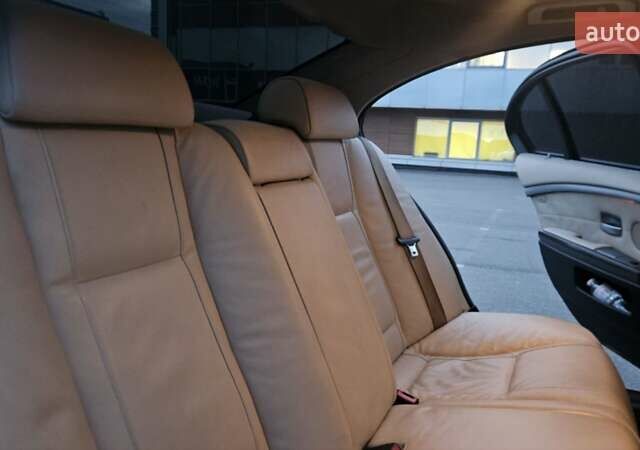 Черный БМВ 7 Серия, объемом двигателя 2.99 л и пробегом 465 тыс. км за 9300 $, фото 26 на Automoto.ua