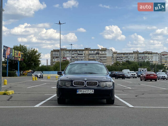 Черный БМВ 7 Серия, объемом двигателя 4.4 л и пробегом 285 тыс. км за 3800 $, фото 3 на Automoto.ua