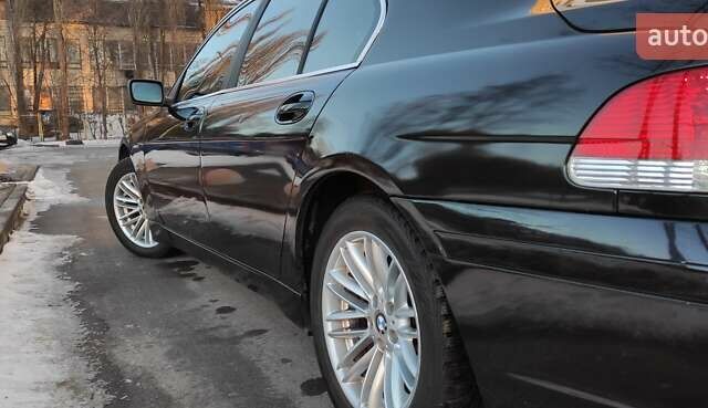 Черный БМВ 7 Серия, объемом двигателя 4.4 л и пробегом 167 тыс. км за 8699 $, фото 107 на Automoto.ua
