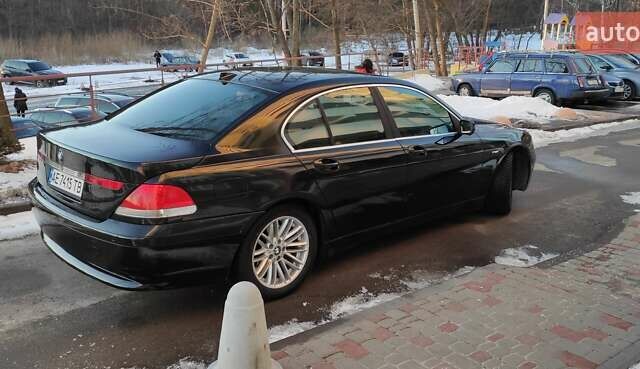 Черный БМВ 7 Серия, объемом двигателя 4.4 л и пробегом 167 тыс. км за 8699 $, фото 103 на Automoto.ua