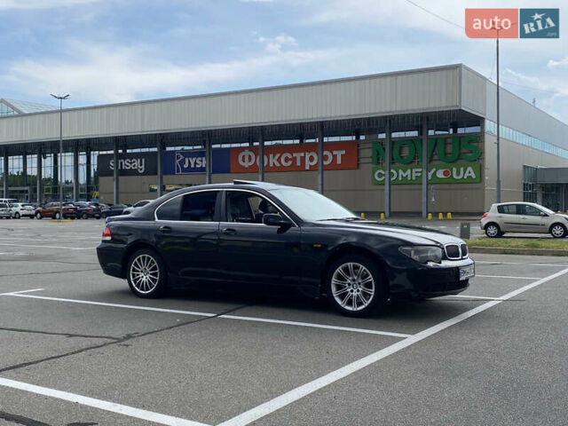 Черный БМВ 7 Серия, объемом двигателя 4.4 л и пробегом 285 тыс. км за 3800 $, фото 9 на Automoto.ua