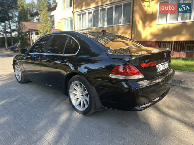 Черный БМВ 7 Серия, объемом двигателя 2.99 л и пробегом 338 тыс. км за 5950 $, фото 2 на Automoto.ua
