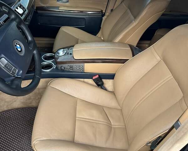 Черный БМВ 7 Серия, объемом двигателя 3.6 л и пробегом 356 тыс. км за 7750 $, фото 2 на Automoto.ua