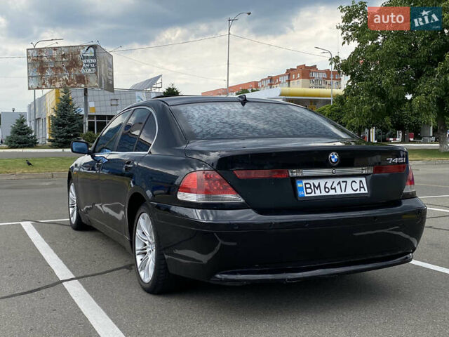 Черный БМВ 7 Серия, объемом двигателя 4.4 л и пробегом 285 тыс. км за 3800 $, фото 5 на Automoto.ua