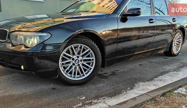 Черный БМВ 7 Серия, объемом двигателя 4.4 л и пробегом 167 тыс. км за 8699 $, фото 56 на Automoto.ua