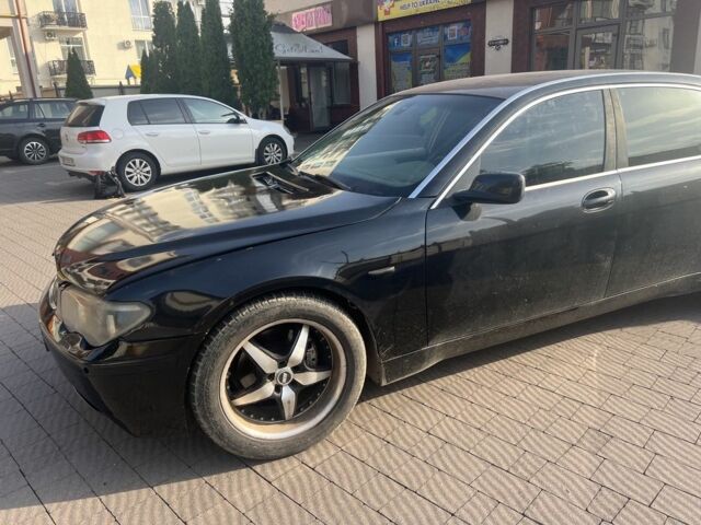 Черный БМВ 7 Серия, объемом двигателя 3.6 л и пробегом 200 тыс. км за 4200 $, фото 2 на Automoto.ua