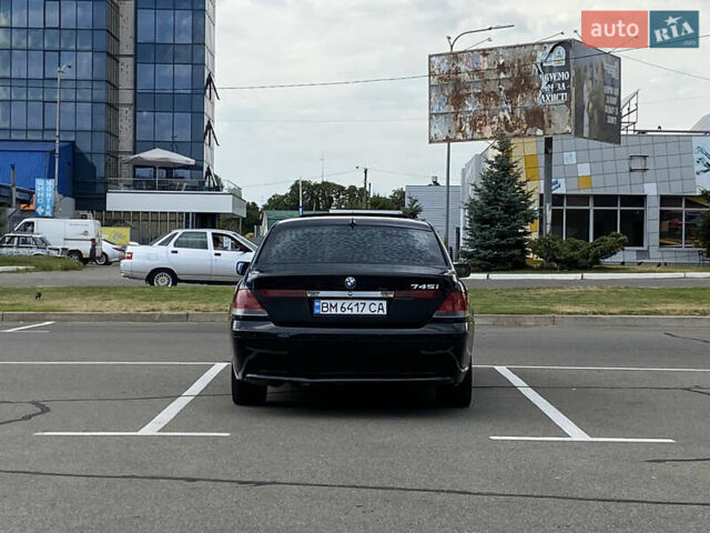 Черный БМВ 7 Серия, объемом двигателя 4.4 л и пробегом 285 тыс. км за 3800 $, фото 7 на Automoto.ua