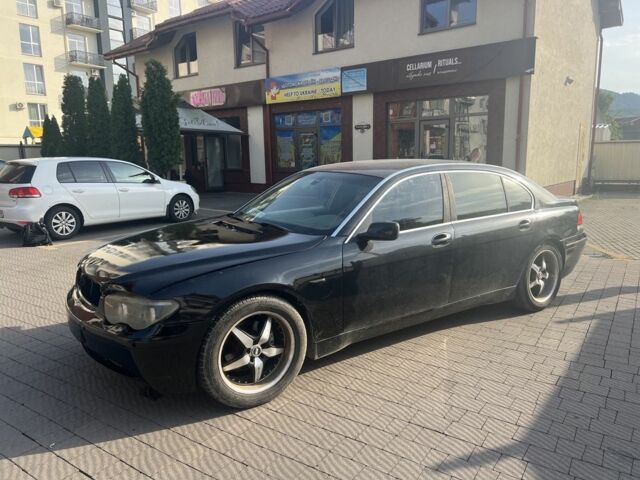 Черный БМВ 7 Серия, объемом двигателя 3.6 л и пробегом 200 тыс. км за 4200 $, фото 1 на Automoto.ua