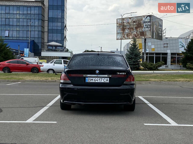 Черный БМВ 7 Серия, объемом двигателя 4.4 л и пробегом 285 тыс. км за 3800 $, фото 8 на Automoto.ua