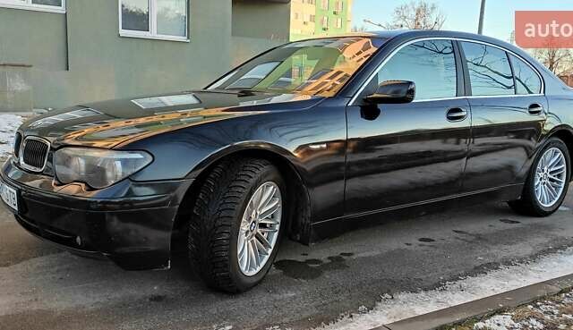 Черный БМВ 7 Серия, объемом двигателя 4.4 л и пробегом 167 тыс. км за 8699 $, фото 92 на Automoto.ua