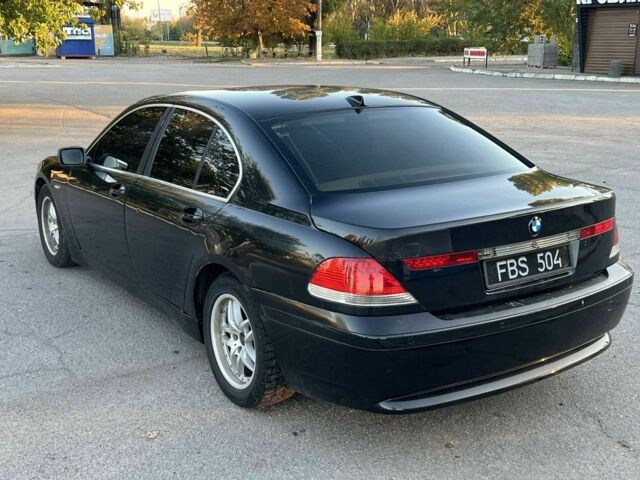 Чорний БМВ 7 Серія, об'ємом двигуна 3 л та пробігом 400 тис. км за 3000 $, фото 1 на Automoto.ua