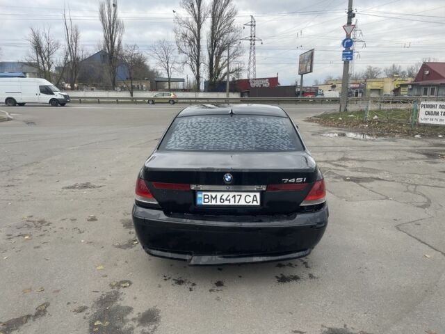 Черный БМВ 7 Серия, объемом двигателя 4.4 л и пробегом 320 тыс. км за 4000 $, фото 2 на Automoto.ua