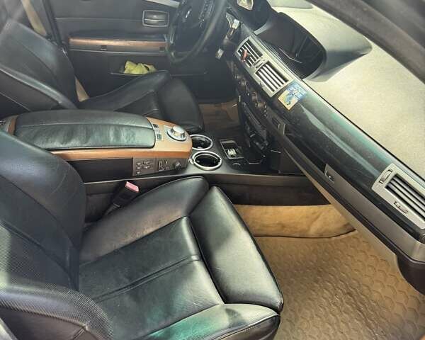 Черный БМВ 7 Серия, объемом двигателя 3 л и пробегом 400 тыс. км за 2500 $, фото 5 на Automoto.ua