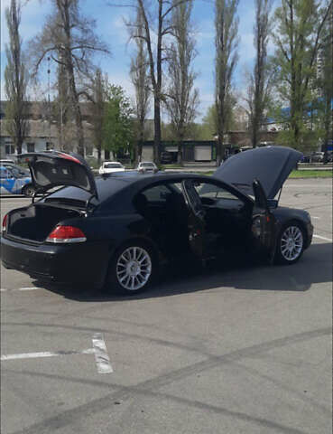 Черный БМВ 7 Серия, объемом двигателя 4.4 л и пробегом 265 тыс. км за 3300 $, фото 4 на Automoto.ua