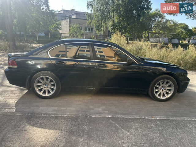 Черный БМВ 7 Серия, объемом двигателя 2.99 л и пробегом 338 тыс. км за 5950 $, фото 5 на Automoto.ua