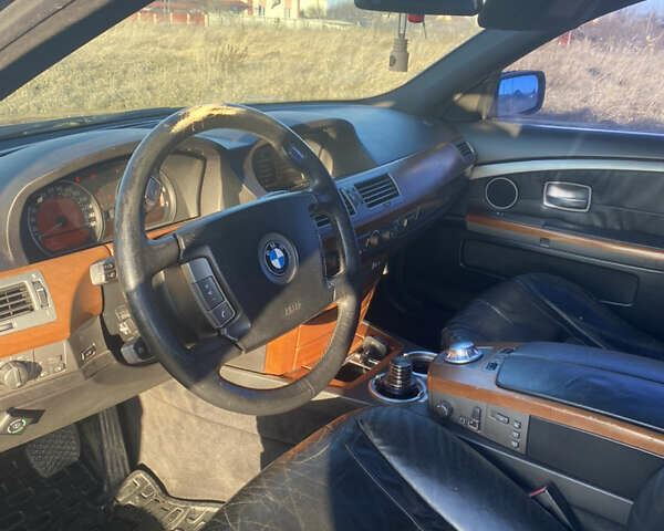 Черный БМВ 7 Серия, объемом двигателя 3.6 л и пробегом 287 тыс. км за 6200 $, фото 8 на Automoto.ua