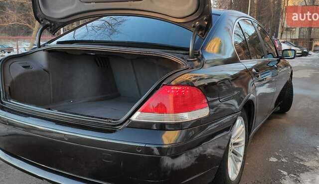 Черный БМВ 7 Серия, объемом двигателя 4.4 л и пробегом 167 тыс. км за 8699 $, фото 91 на Automoto.ua