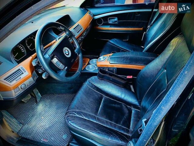 Чорний БМВ 7 Серія, об'ємом двигуна 3.6 л та пробігом 275 тис. км за 6000 $, фото 3 на Automoto.ua