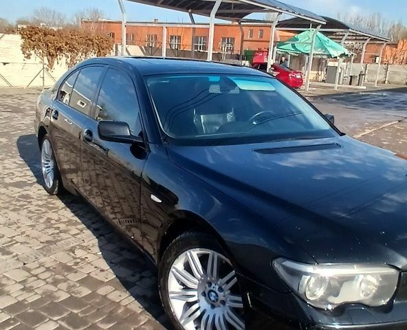 Чорний БМВ 7 Серія, об'ємом двигуна 3 л та пробігом 300 тис. км за 3200 $, фото 1 на Automoto.ua