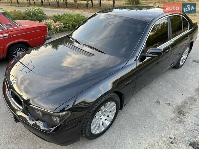 Черный БМВ 7 Серия, объемом двигателя 3.6 л и пробегом 356 тыс. км за 7750 $, фото 19 на Automoto.ua