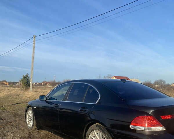 Черный БМВ 7 Серия, объемом двигателя 3.6 л и пробегом 287 тыс. км за 6200 $, фото 5 на Automoto.ua