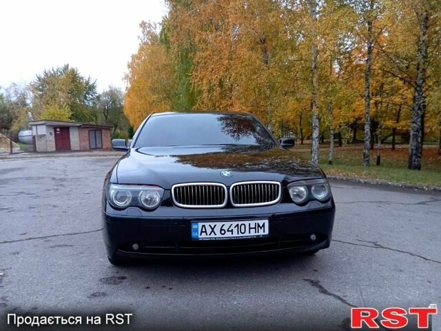 Чорний БМВ 7 Серія, об'ємом двигуна 3.5 л та пробігом 441 тис. км за 6200 $, фото 1 на Automoto.ua