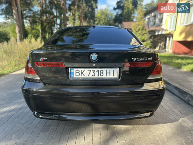 Черный БМВ 7 Серия, объемом двигателя 2.99 л и пробегом 338 тыс. км за 5950 $, фото 3 на Automoto.ua