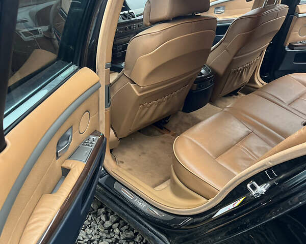 Черный БМВ 7 Серия, объемом двигателя 3.6 л и пробегом 380 тыс. км за 7000 $, фото 6 на Automoto.ua