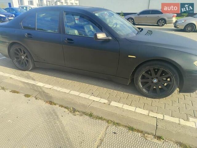 Черный БМВ 7 Серия, объемом двигателя 2.99 л и пробегом 372 тыс. км за 8000 $, фото 2 на Automoto.ua