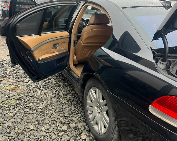 Черный БМВ 7 Серия, объемом двигателя 3.6 л и пробегом 380 тыс. км за 7000 $, фото 5 на Automoto.ua