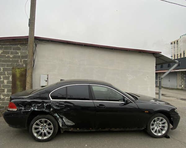 Черный БМВ 7 Серия, объемом двигателя 4.4 л и пробегом 400 тыс. км за 3600 $, фото 2 на Automoto.ua