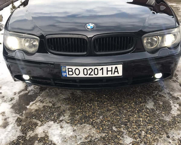 Черный БМВ 7 Серия, объемом двигателя 4.4 л и пробегом 465 тыс. км за 5600 $, фото 19 на Automoto.ua