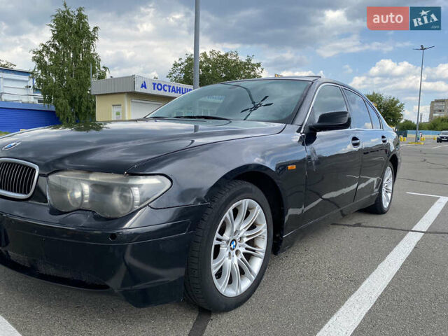 Черный БМВ 7 Серия, объемом двигателя 4.4 л и пробегом 285 тыс. км за 3800 $, фото 13 на Automoto.ua