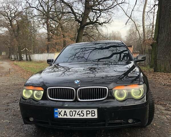 Чорний БМВ 7 Серія, об'ємом двигуна 4.4 л та пробігом 336 тис. км за 5800 $, фото 2 на Automoto.ua