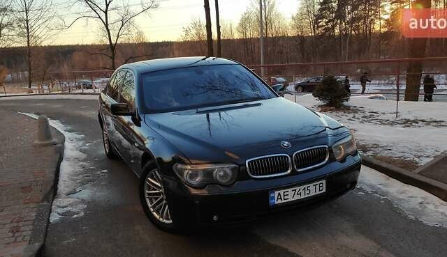 Черный БМВ 7 Серия, объемом двигателя 4.4 л и пробегом 167 тыс. км за 8699 $, фото 101 на Automoto.ua